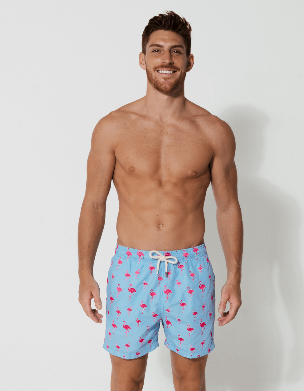 BLUE SWIM SHORTS WITH FLAMINGO ALL OVER PRINT, BABY BLUE SWIM SHORTS WITH FLAMINGO ALL OVER PRINT, BABY
