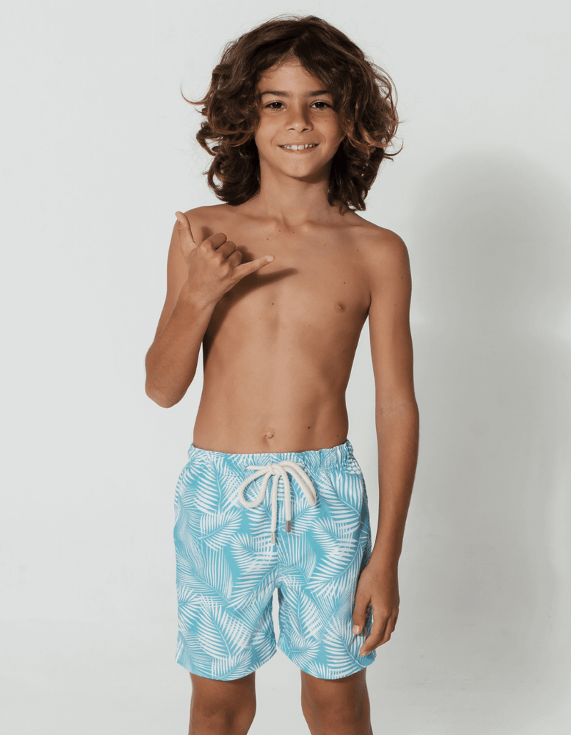 Tommy wearing Green Fern Boys Swim Shorts, size Age 8